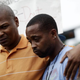 Michael Brown's cousin Eric Davis and Louis Head, Brown’s stepfather, attend a news conference Aug. 15, 2014, in Ferguson, Mo.
Joshua Lott/AFP/Getty Images